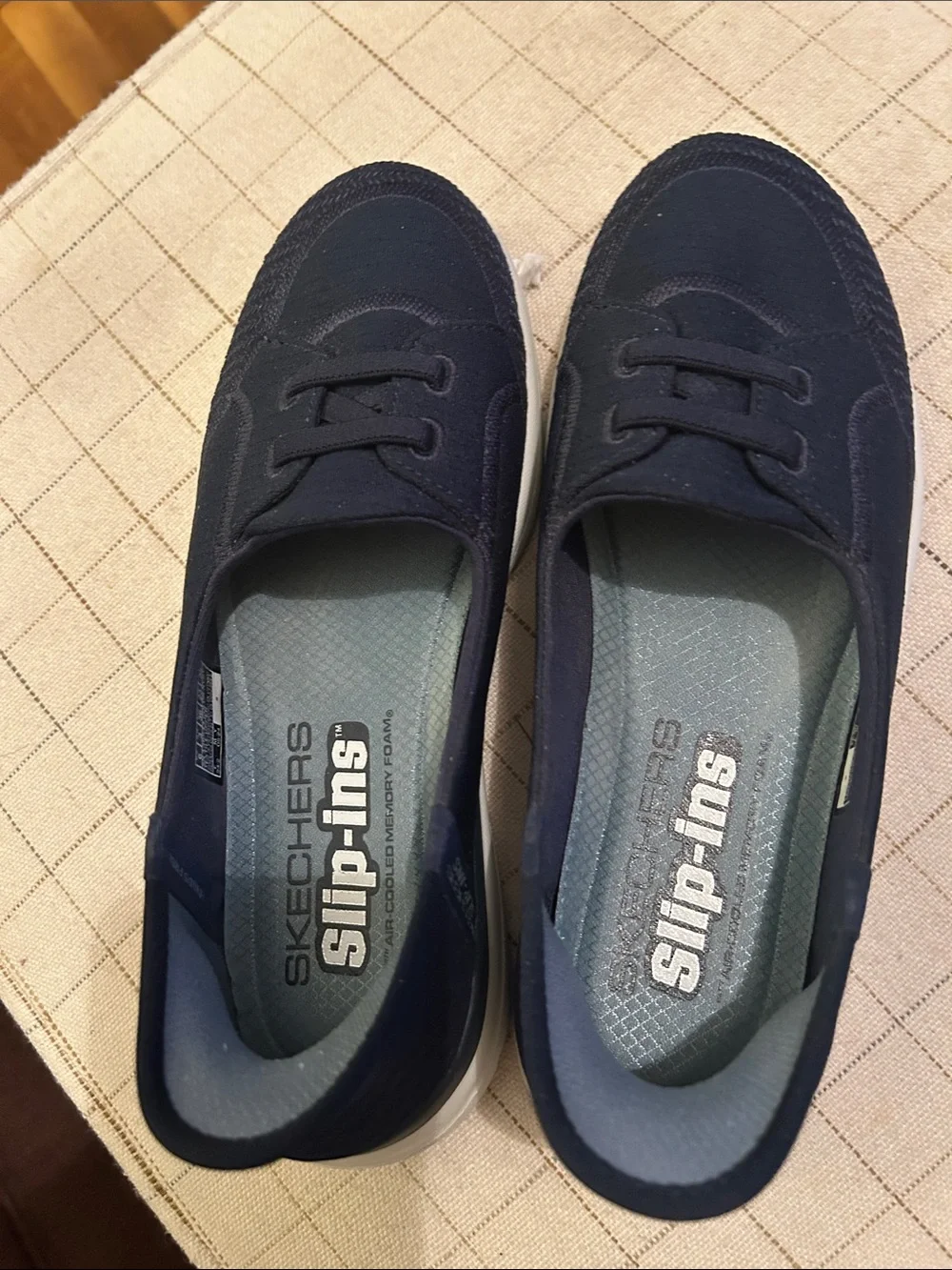 Skechers Navy Slip-Ins with White Soles